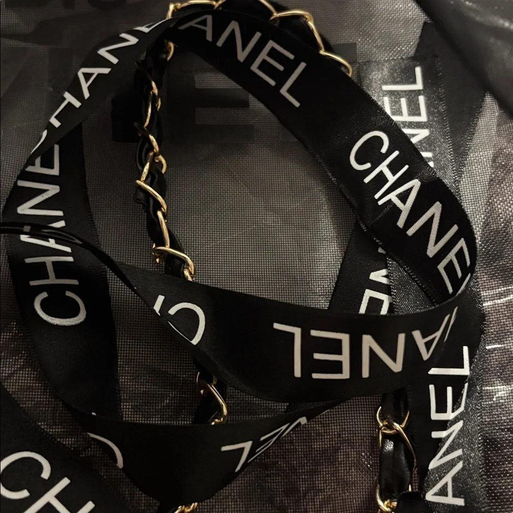 CHANEL Black Mesh Paris Tote with Matching Cosmetic Pouch